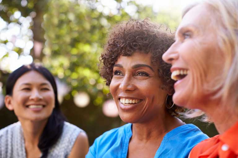 three women of different ages and races